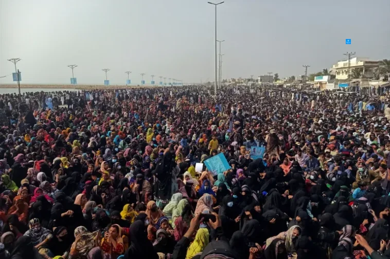 BYC supporters listen to the speech of their leader during their protest in Gwadar on Sunday [Reuters]